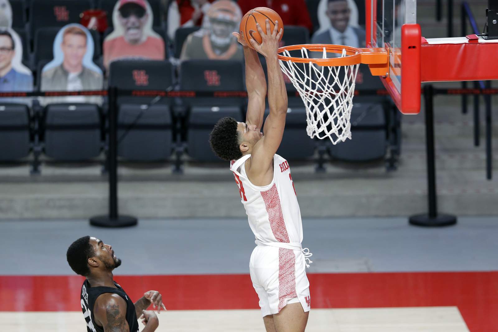 No. 11 Houston uses big first half to cruise past UCF 75-58