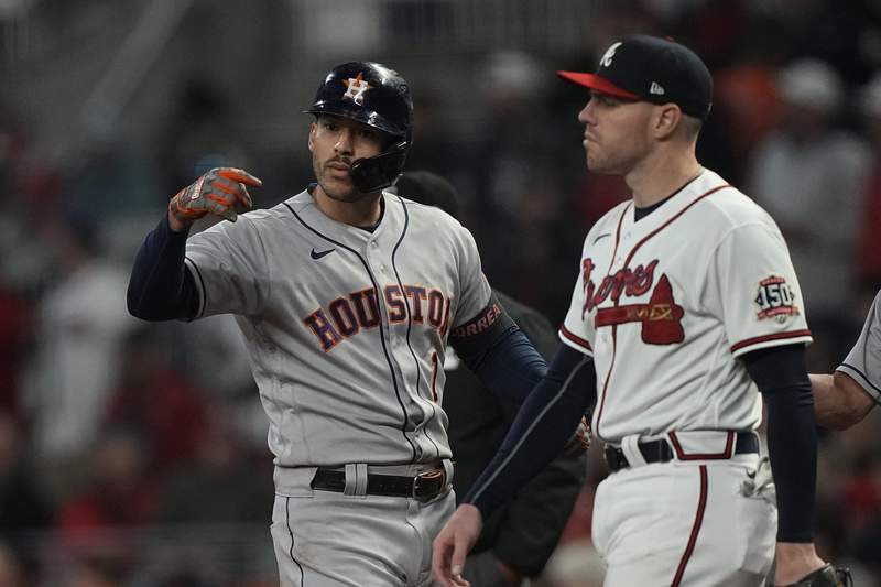 The Latest: Altuve adds run, Astros push lead to 9-5