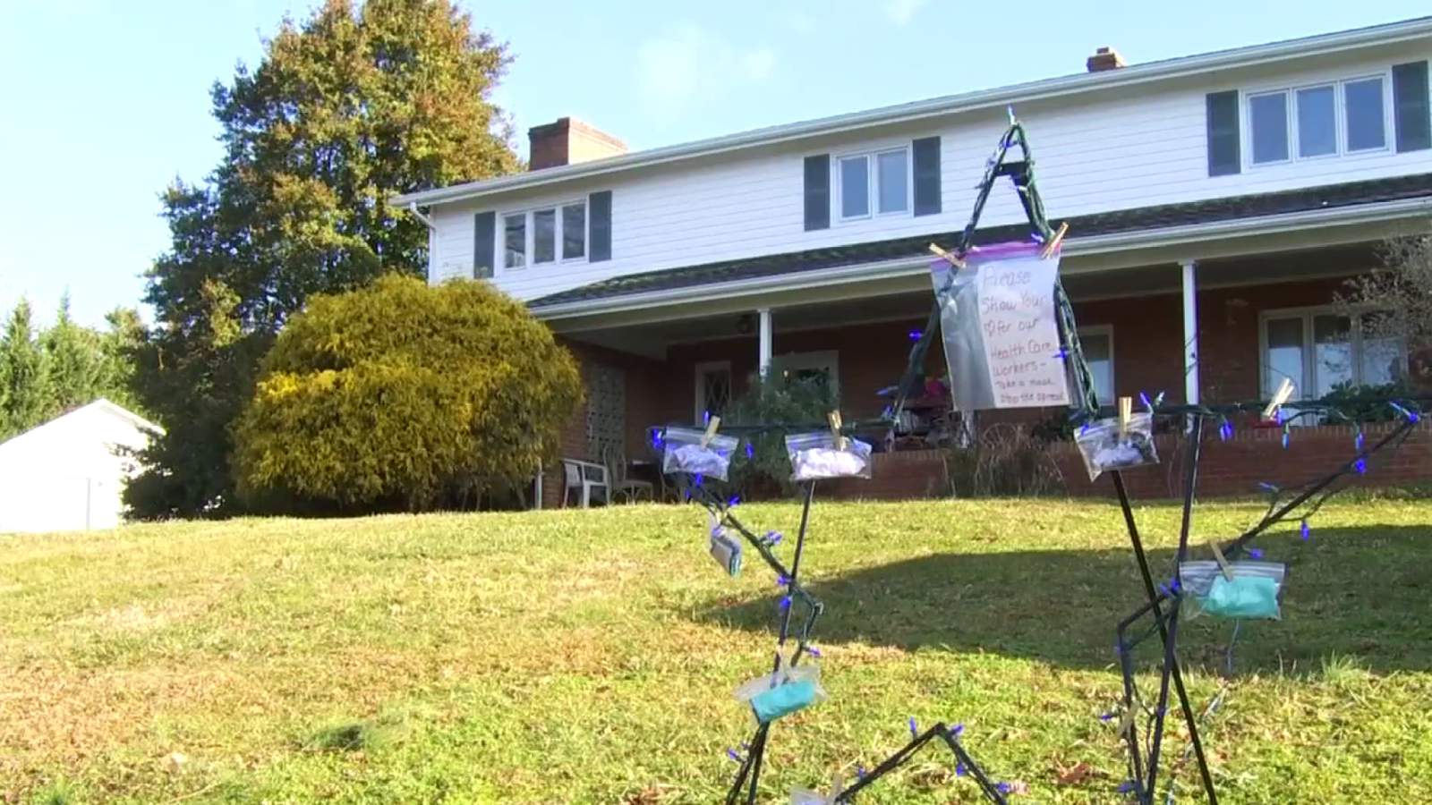 ‘Take a mask. Stop the spread’: Salem woman honors healthcare workers with yard display