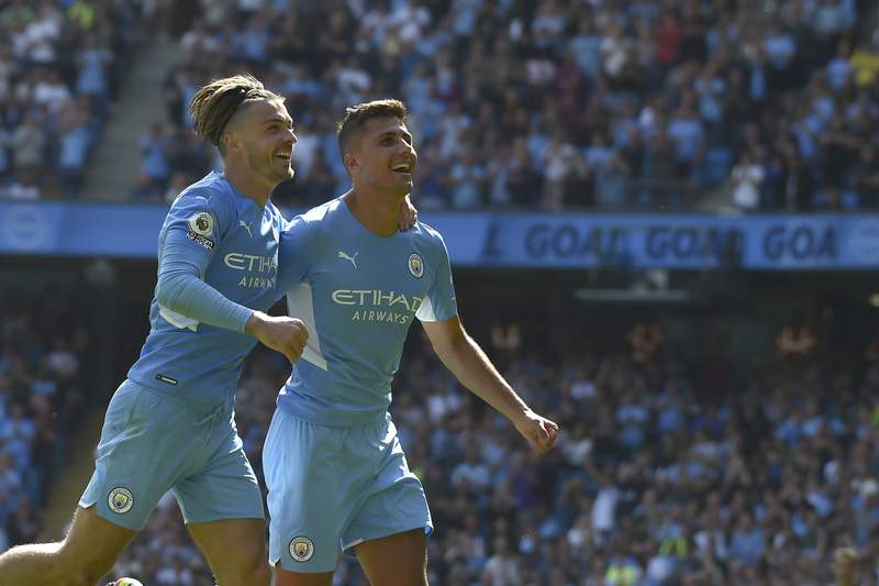 City routs Arsenal even without Kane; Liverpool-Chelsea draw