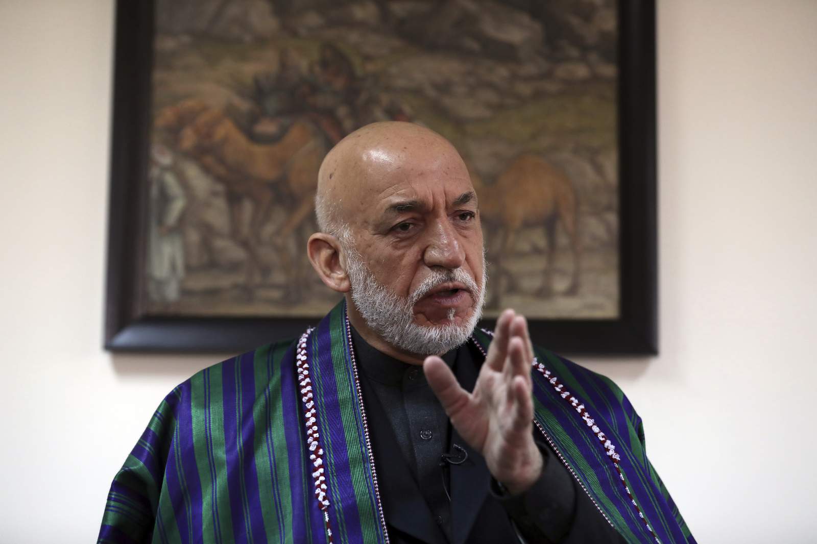 AP Interview: Karzai says US plan catalyst for Afghan peace