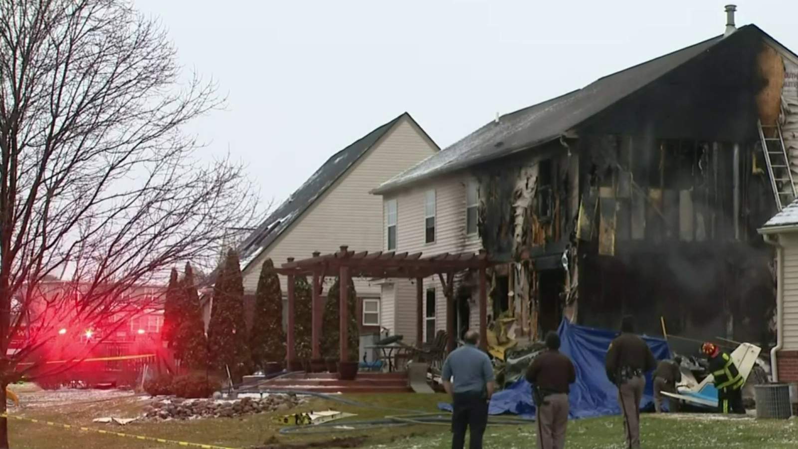Businessman and family die when plane hits Michigan house