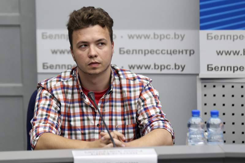 Jailed Belarus journalist, girlfriend moved to house arrest
