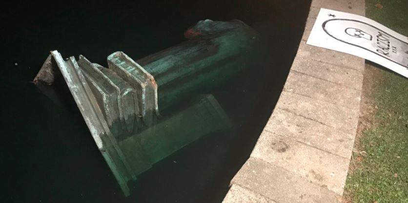 Richmond protesters topple Columbus statue, throw it in lake