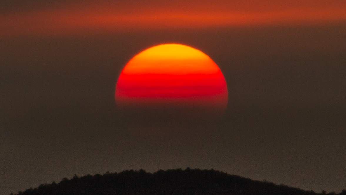 PHOTO GALLERY: Smoke from Colorado wildfires adds color to weekend sunset