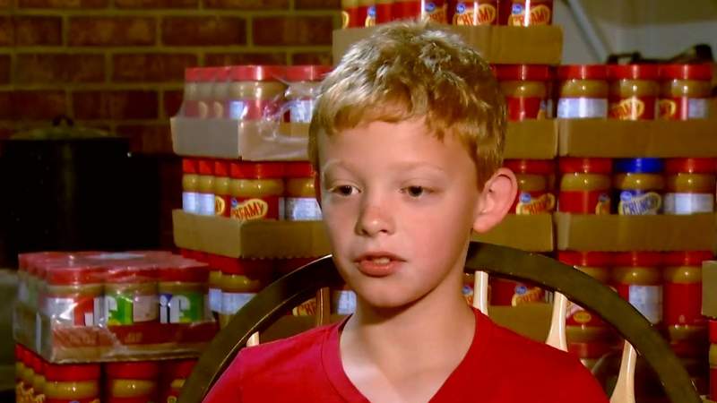 Buchanan boy collects more than 2,000 jars of peanut butter to help kids in need