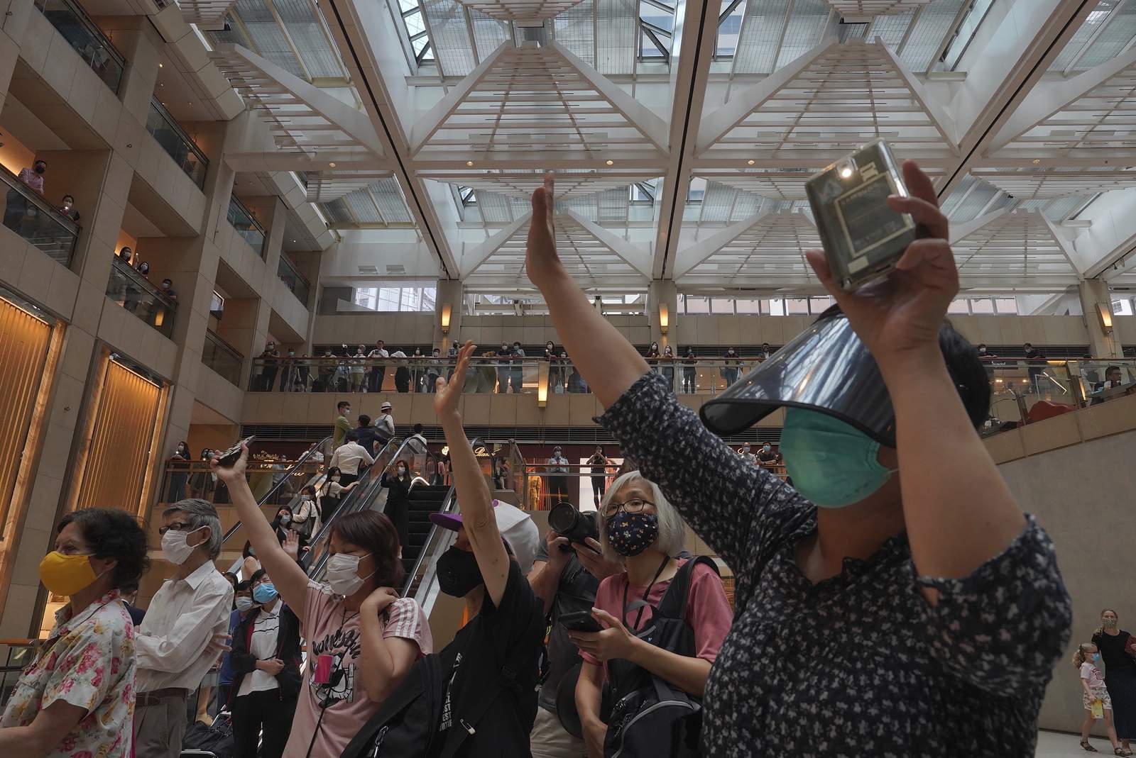 Hong Kong blocks Tiananmen vigil; rush on for UK passports