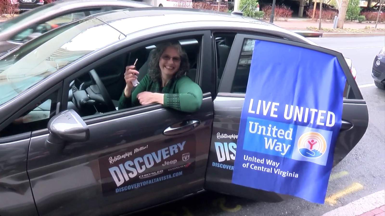 Bedford woman wins new car thanks to her own generosity
