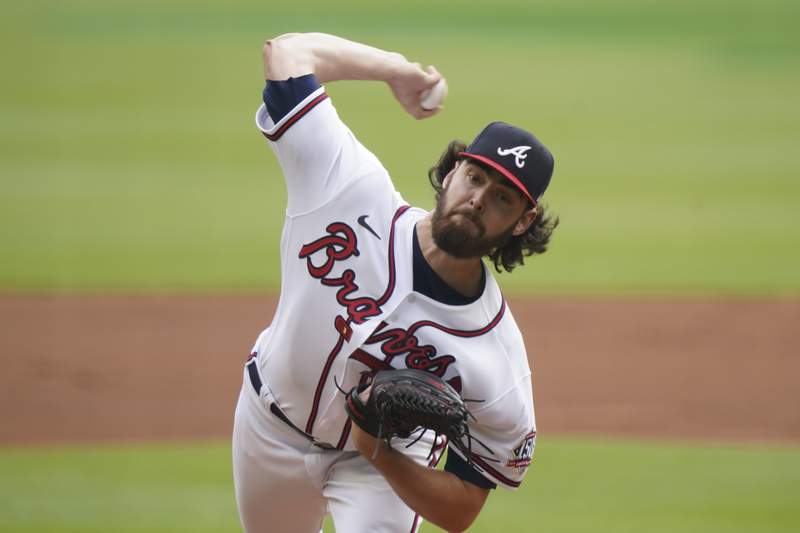 LEADING OFF: Braves make their pitch to close out Brewers