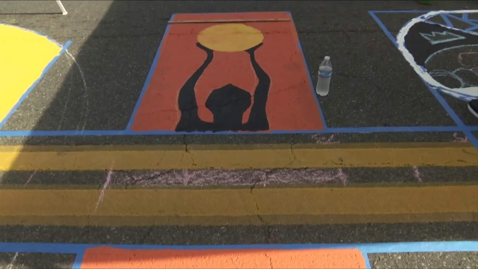 Roanoke artists paint ‘End Racism Now’ on street outside of Municipal Building