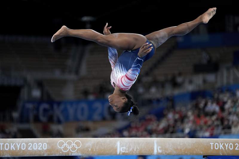 Biles returns to Olympic competition, wins bronze on beam