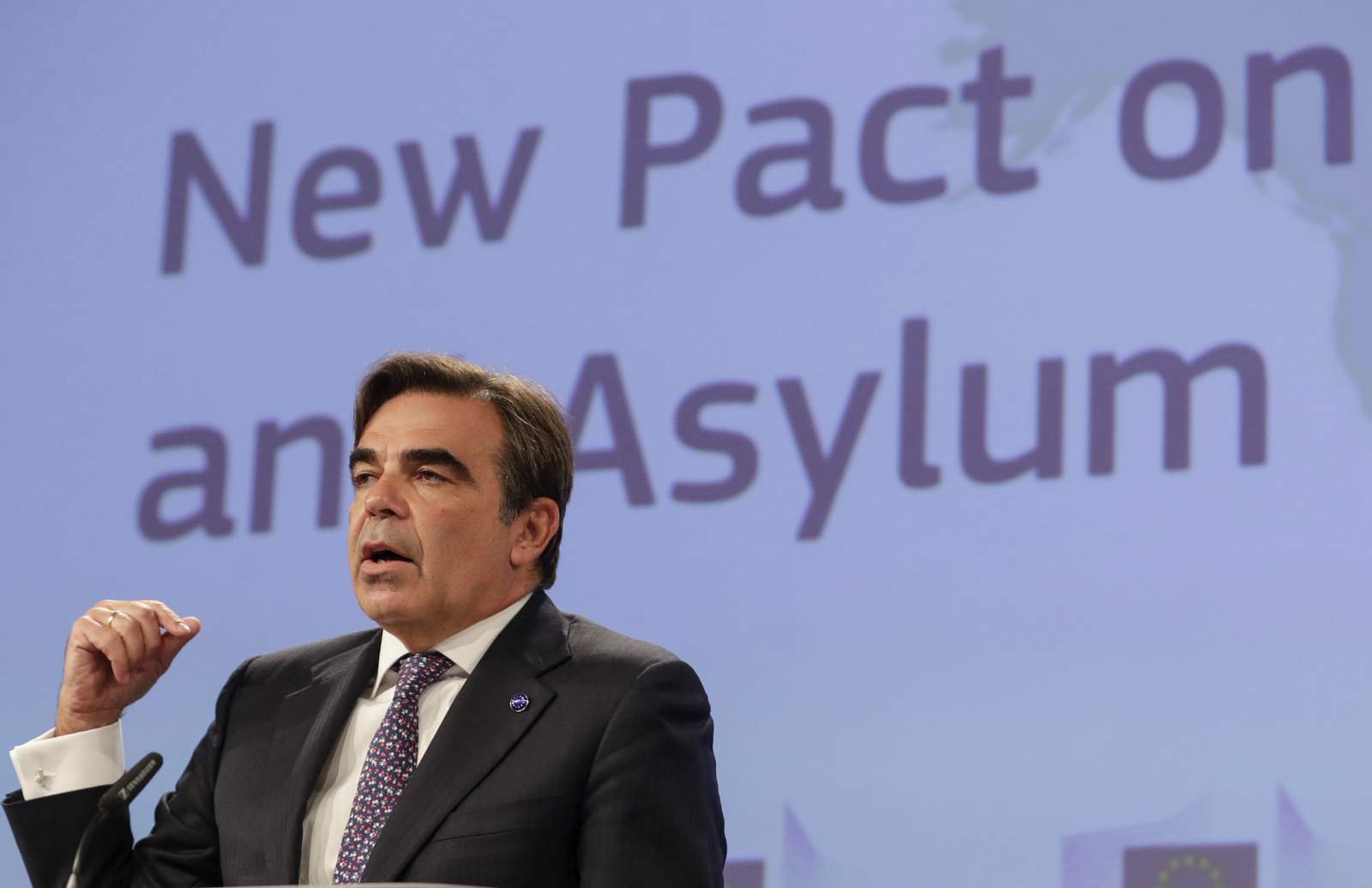 EU tries to sell migrant pact amid claims the hardliners won
