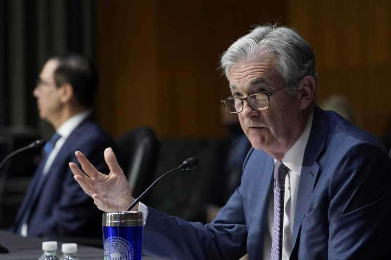 Powell says economy growing rapidly, inflation up 'notably'