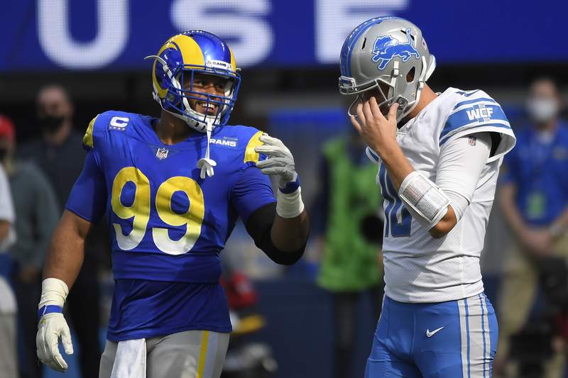 Stafford throws 3 TD passes, Rams edge Goff's Lions 28-19