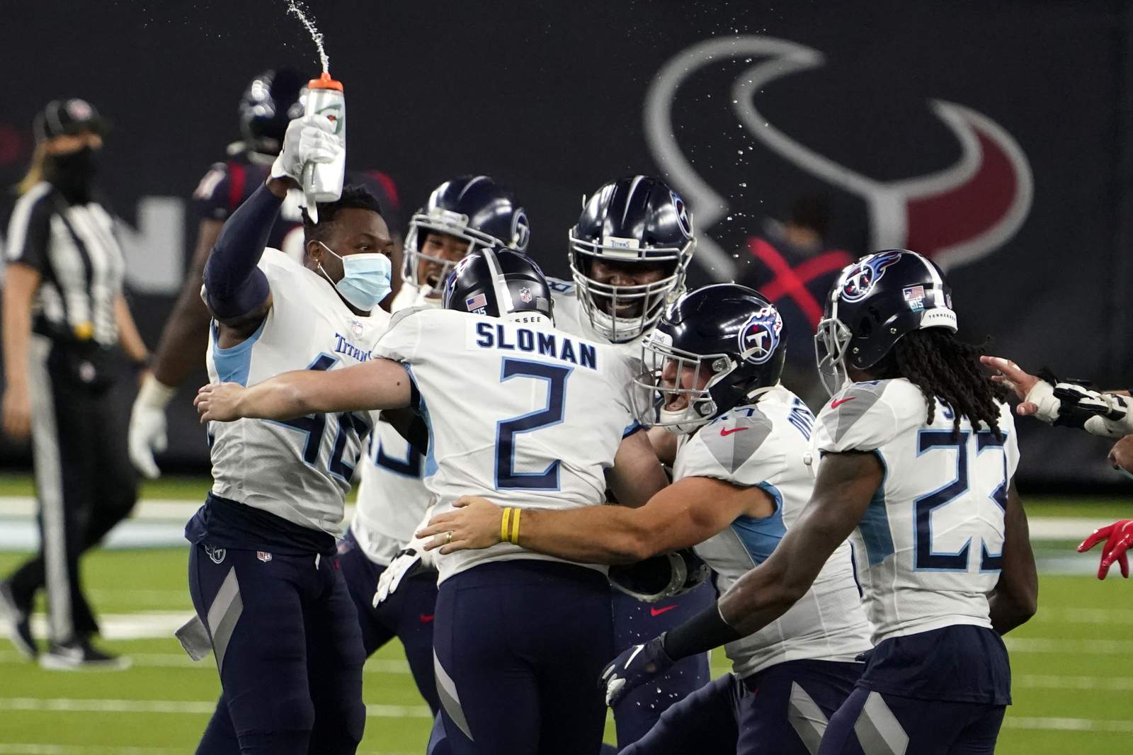 The Latest: Henry runs for 2k, Titans' doink wins AFC South