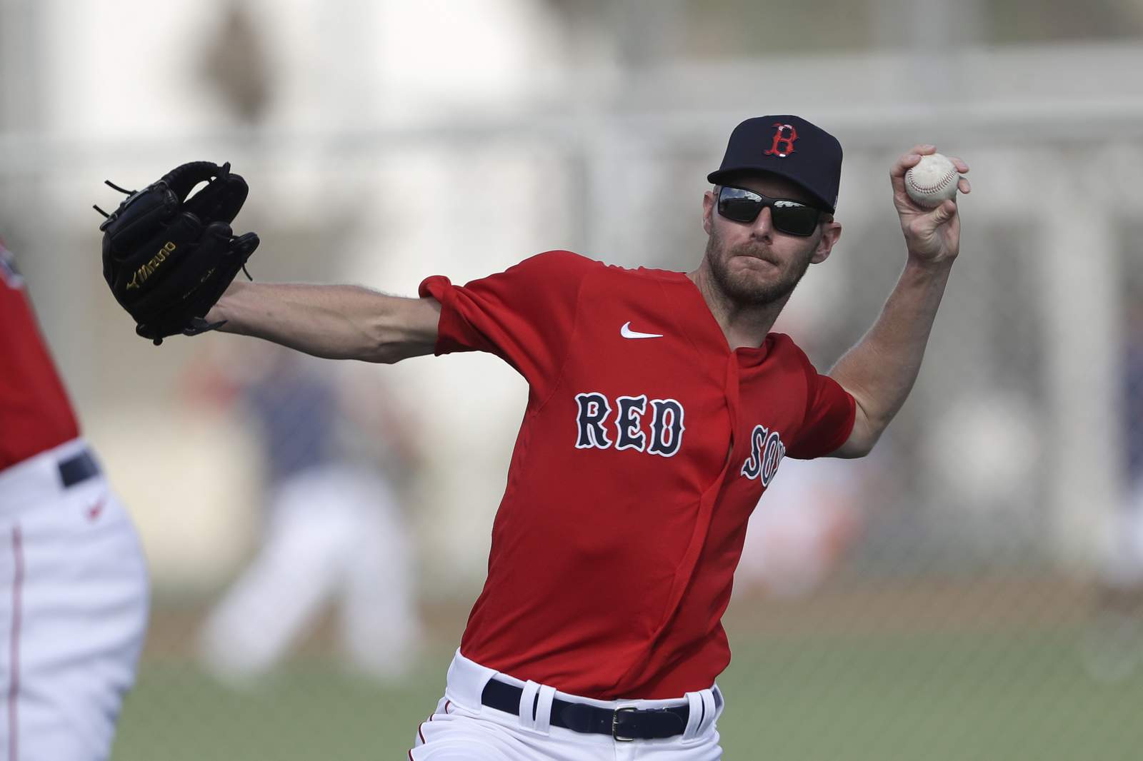 Sale has strained elbow, pitching-needy Red Sox sign McHugh