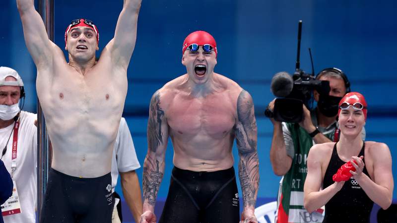 Great Britain wins gold, breaks world record in first Olympic mixed medley relay