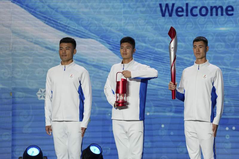 Olympic flame arrives in Beijing amid boycott calls