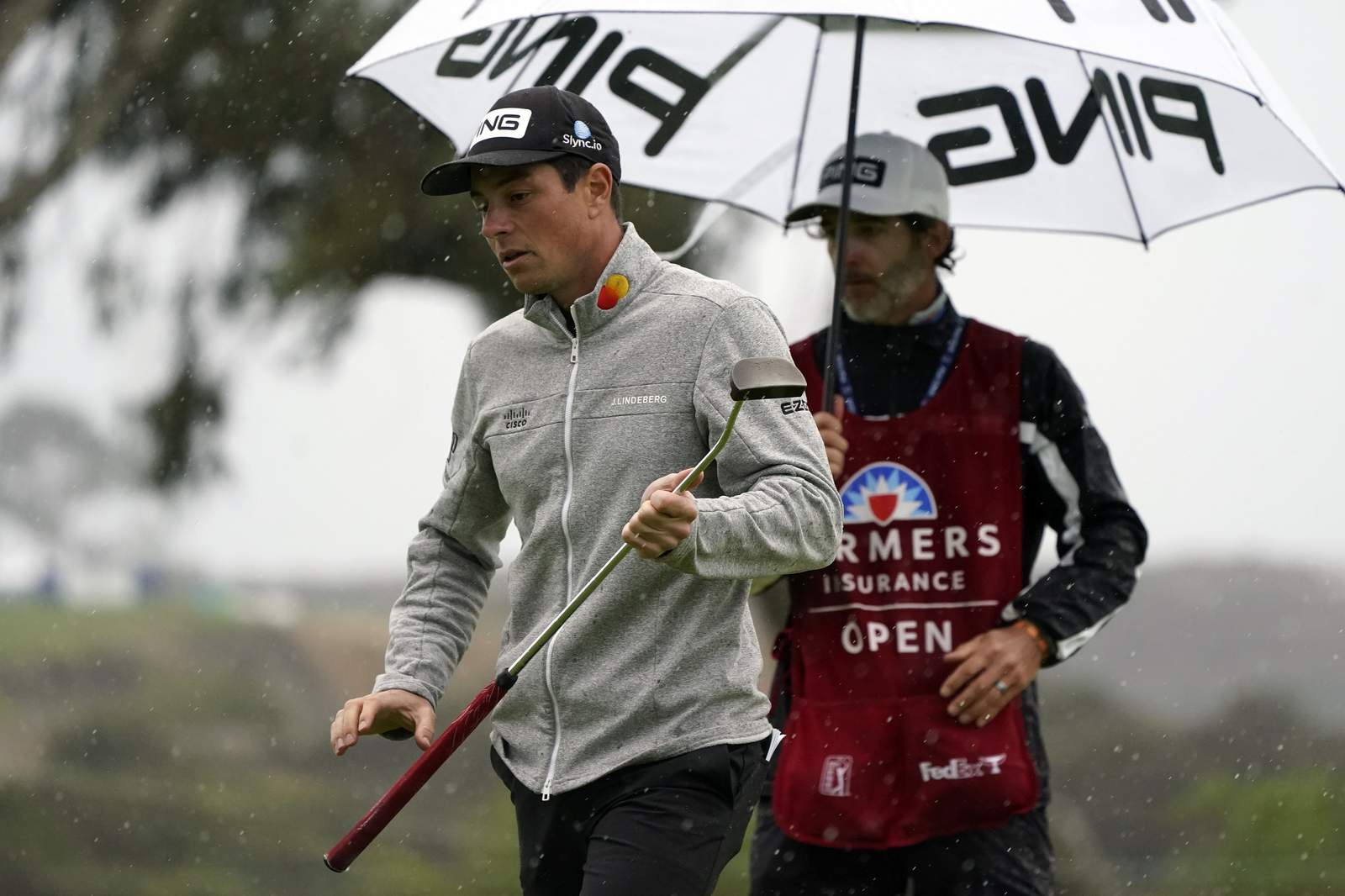 Viktor Hovland vaults into Farmers lead at wet Torrey Pines